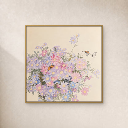 Square wildflower and butterfly painting in a slim gold floating frame on a warm ivory wall