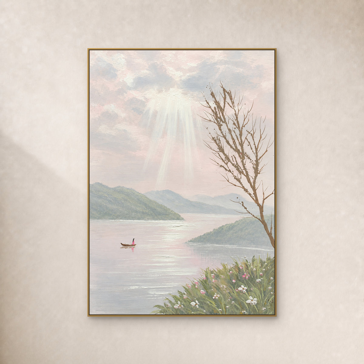 Pastel lake painting with a tiny boat and light rays in a thin gold frame on an ivory wall
