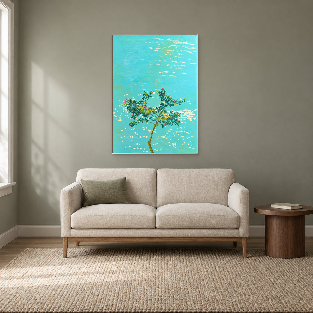 Blossoms over Turquoise in a white floating frame above a cream reading settee on a sage wall