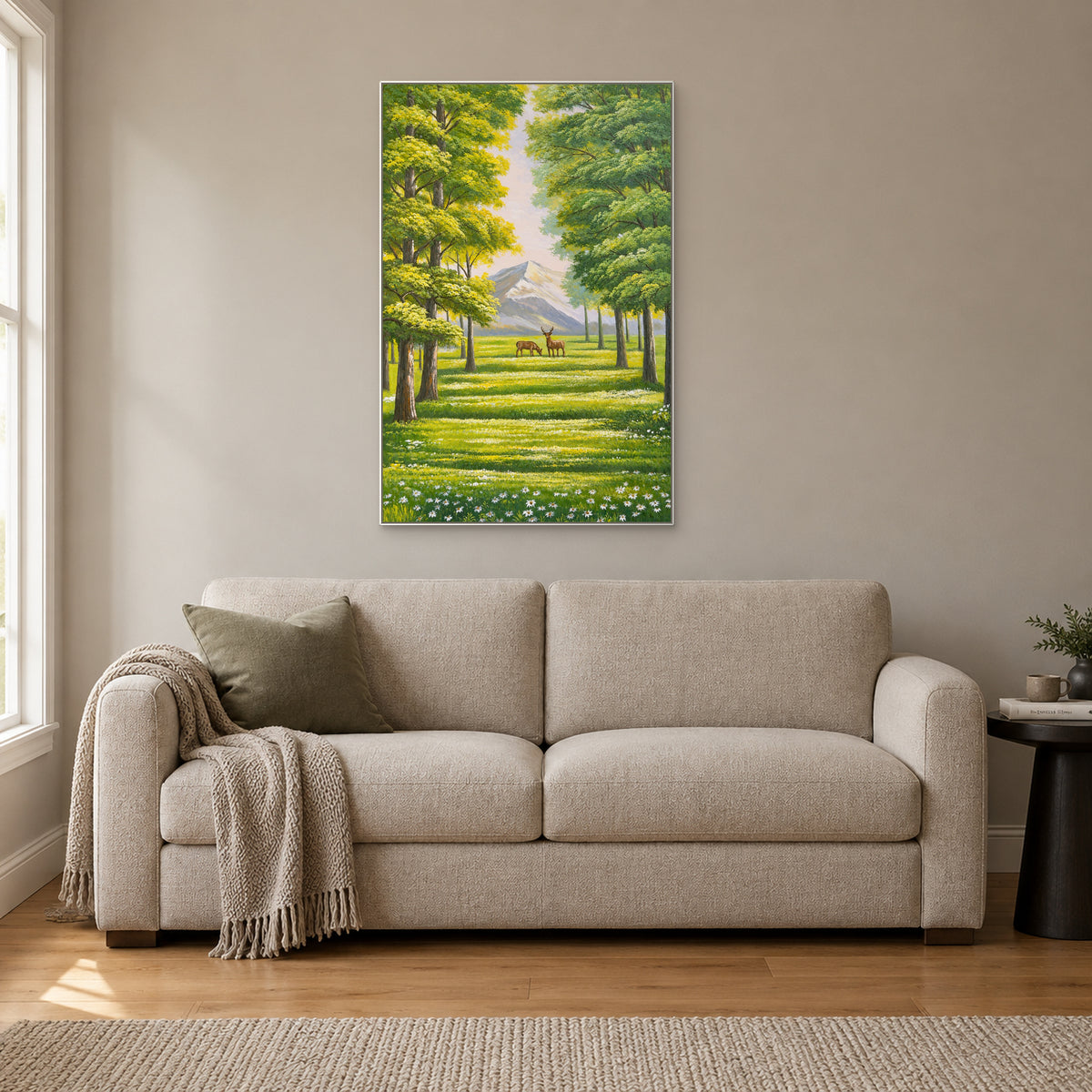 Deer in the Sunlit Grove in a slim white frame above an oatmeal reading sofa
