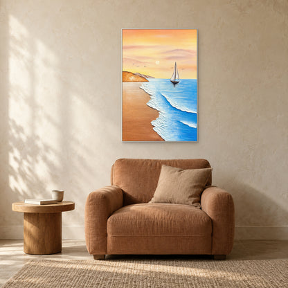White-sail coastal painting in a white frame above a terracotta armchair beside a small round table