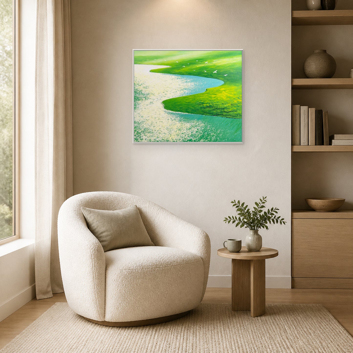 Flight Over Green Meadows in a slim white floating frame beside an ivory reading chair