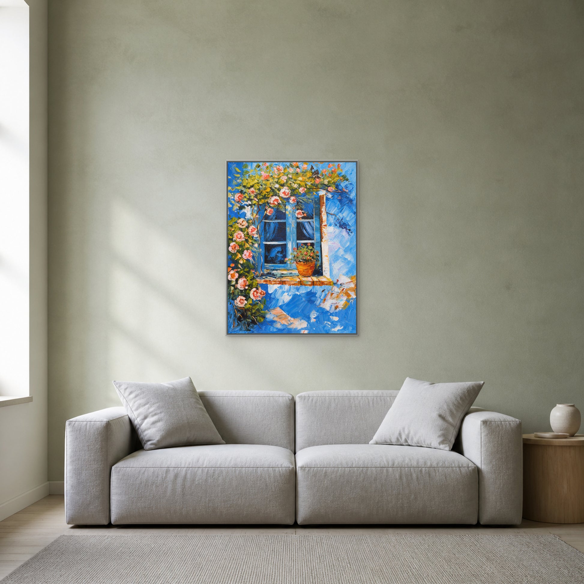 Blue Window in Bloom in a slim silver floating frame above a light neutral living room sofa