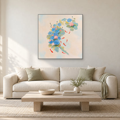 Square lotus and koi artwork in a silver-toned frame centred above a cream sofa