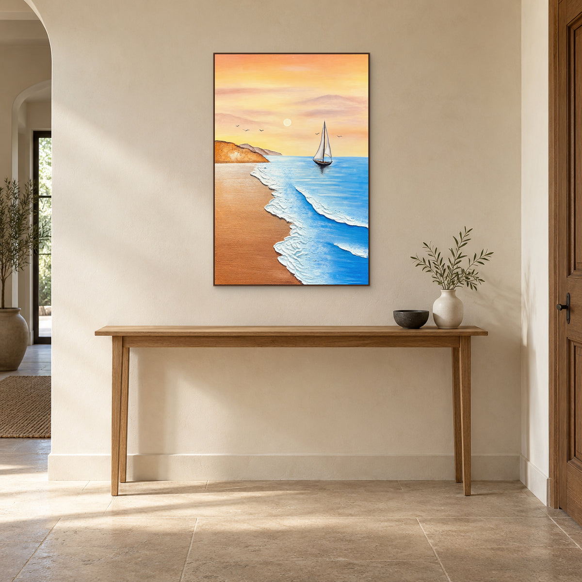 Sailboat and scalloped white foam in a walnut-tone frame above a wooden entry console