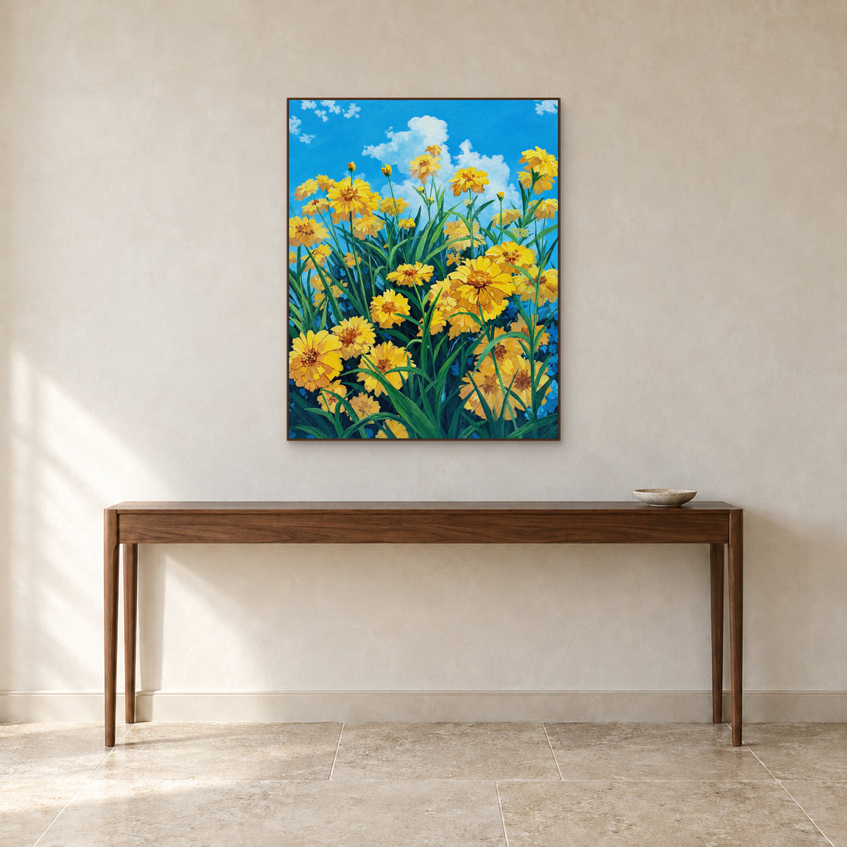 Tableau vertical de fleurs jaunes dans un cadre ton noyer, au-dessus d'une console d'entrée