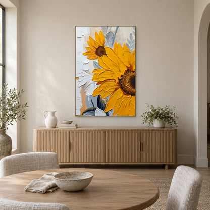 Champagne-framed sunflower artwork above a fluted oak sideboard in a neutral dining room