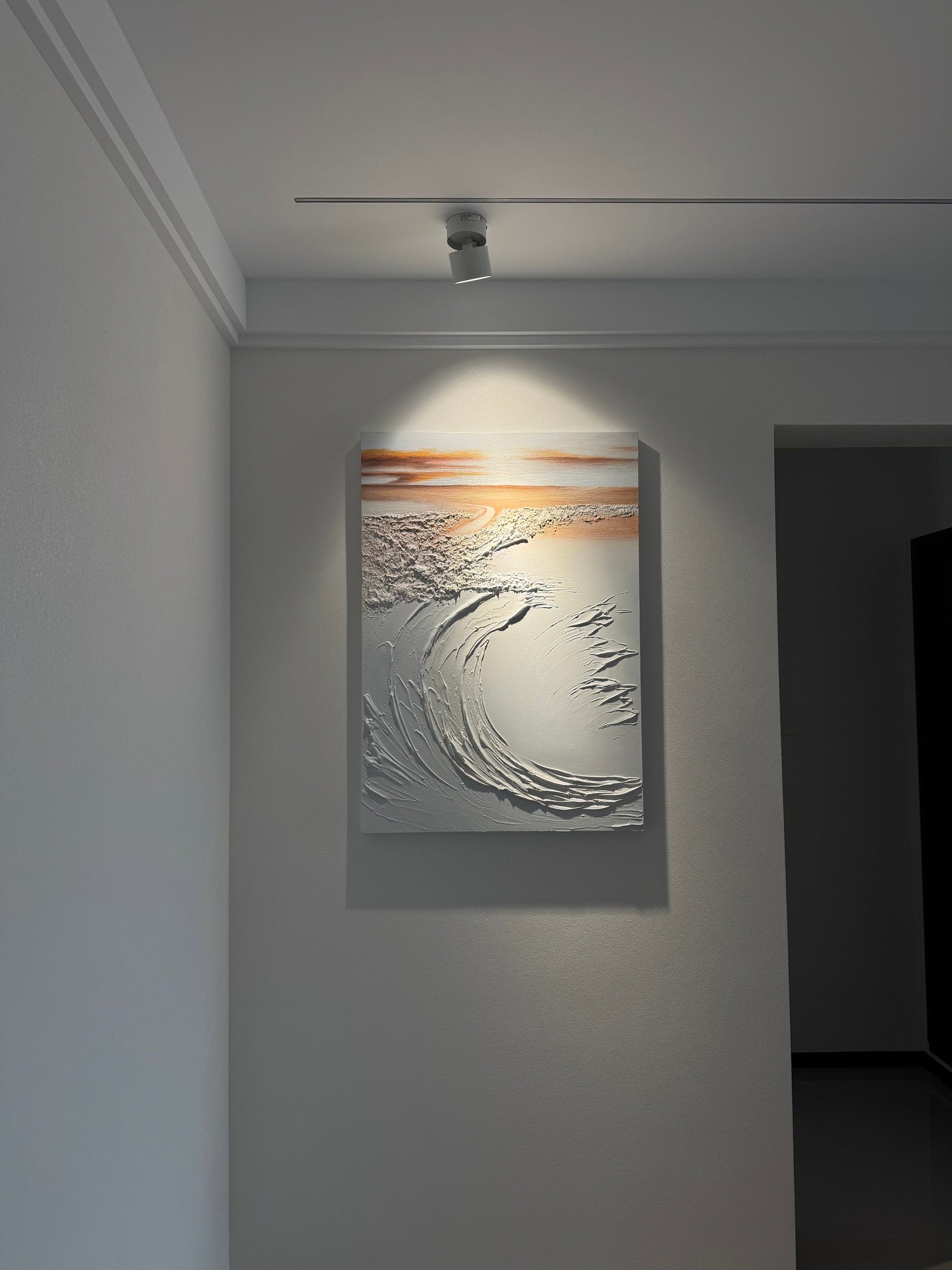 Aegean Oscillation textured wave painting displayed under a ceiling spotlight