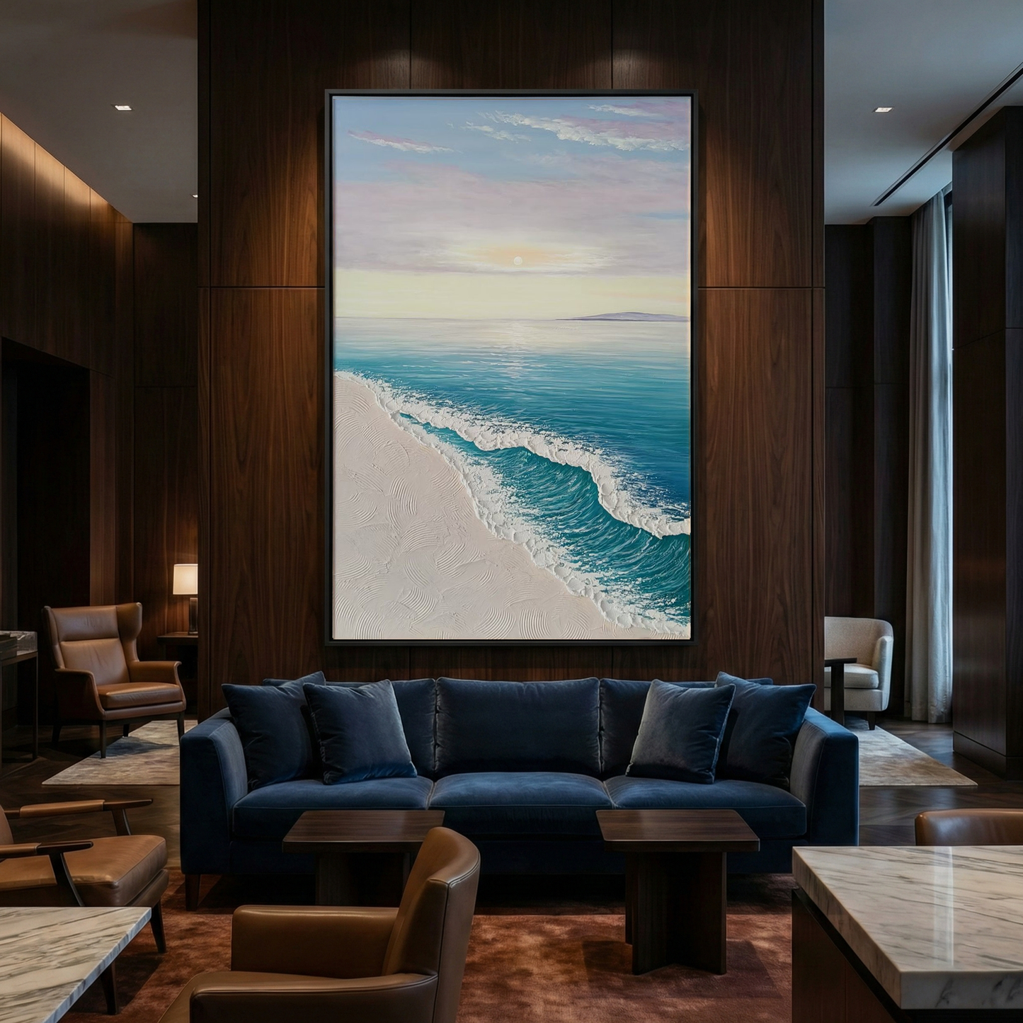 Ethereal Tide coastal art above a navy sofa in a dark lounge