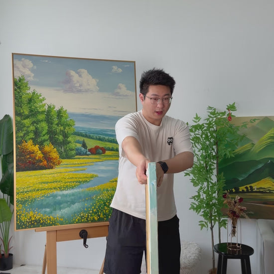 Workshop video showing the hand-painted sunflower field turning from an angled side view to a complete frontal view