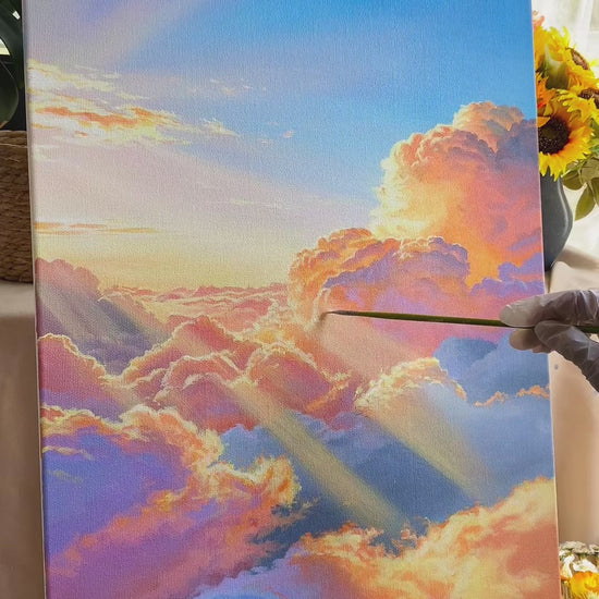 Hand-painting a luminous cloudscape, from the blue sky and warm cloud layers to diagonal sunbeams and the finished painting