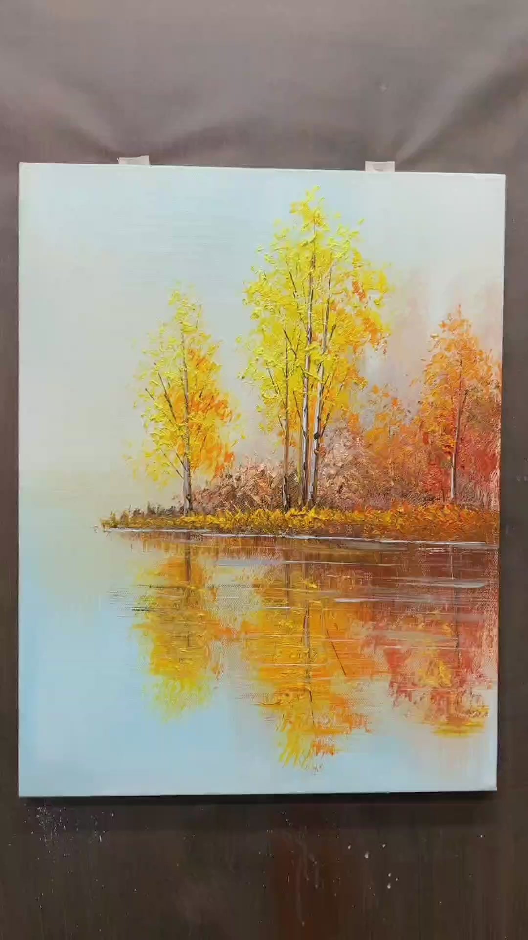 Painting golden foliage, birch trunks and lake ripples, ending with the completed autumn reflection scene