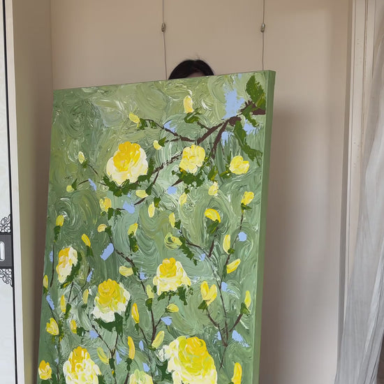 Studio video showing the yellow rose painting turning towards a full frontal view