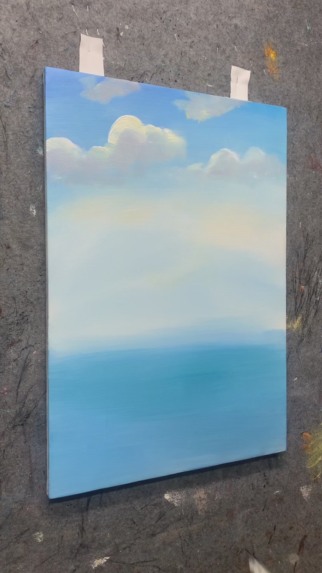 Mountain slopes and their lake reflection painted by hand, followed by surface details and a full view of the artwork