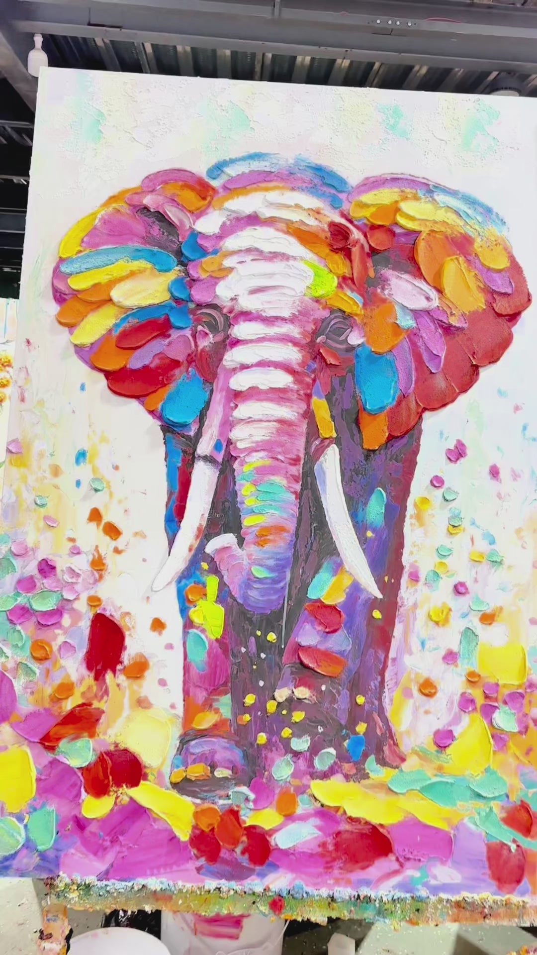 Elephant painting shown in full, followed by close views of its raised colourful strokes