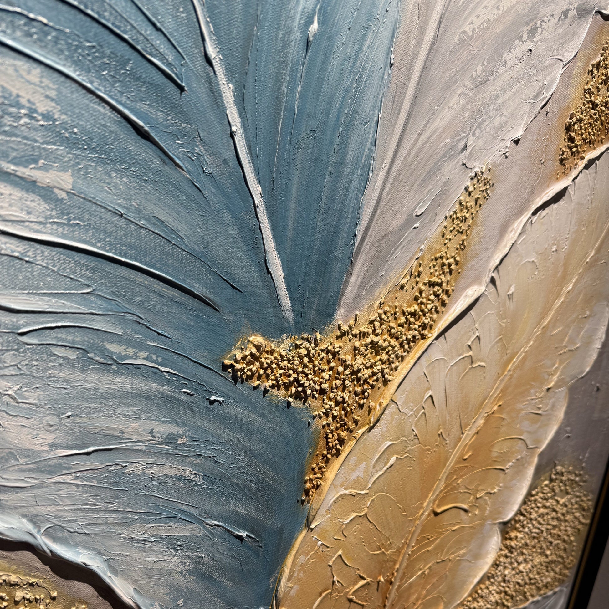Close view of The Aurea Canopy gold-toned granular leaf details